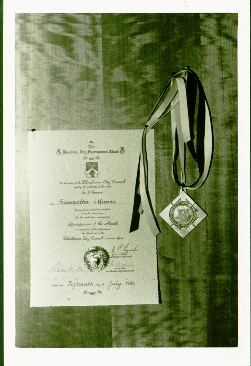Blacktown City Sportsperson of the Month certificate and medal