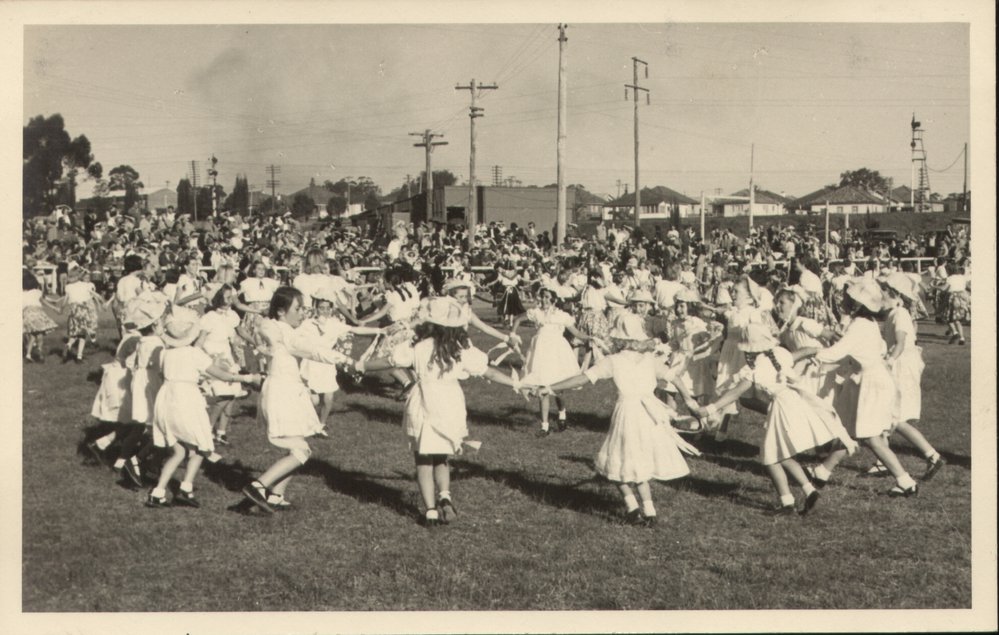 Folk dancing by students of Blacktown Public School at coronation celebrations, 1953