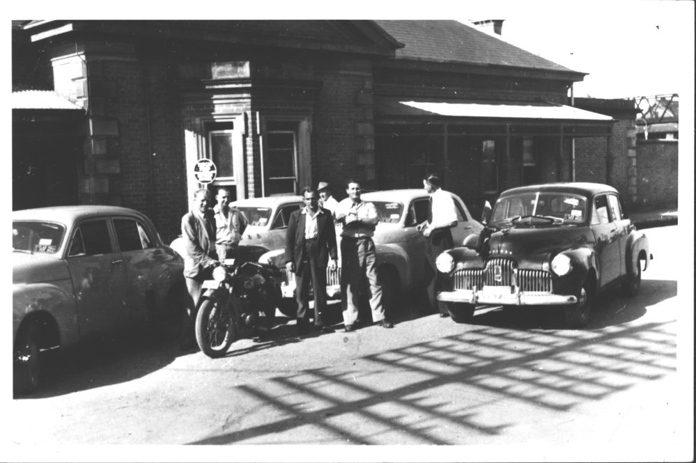 Taxi cars at Blacktown railway station, c1952