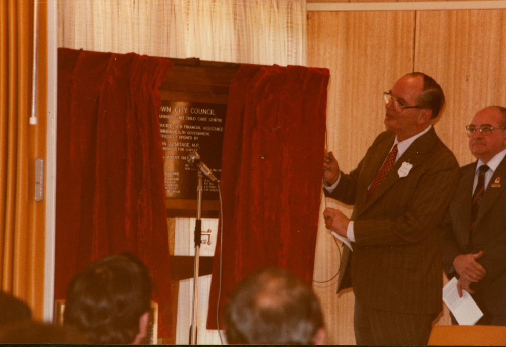 John Armitage unveils the plaque at official opening of the Willmot Neighbourhood and Nan Moran Child Care Centre