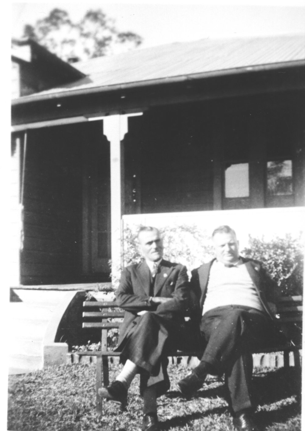 Men sitting on bench