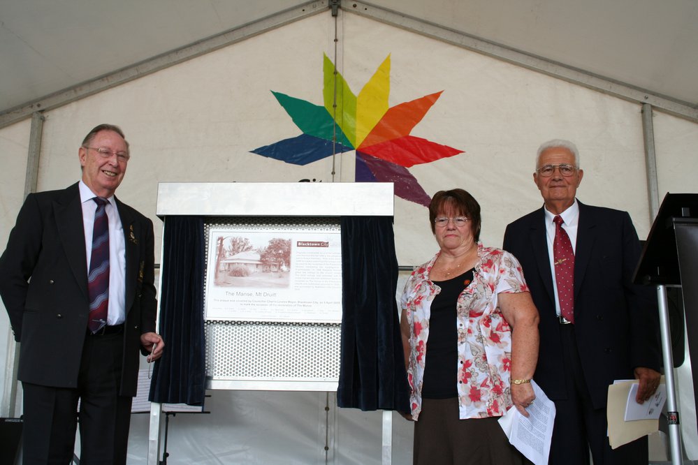 Unveiling the commemorative plaque for the restored building, The Manse