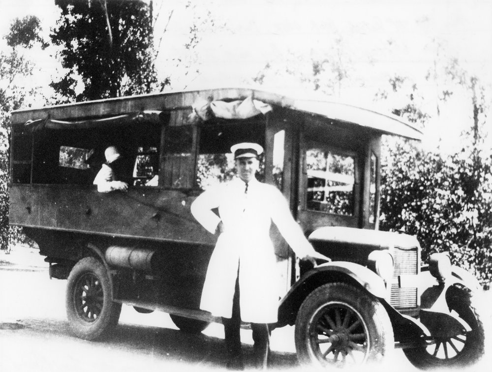 Mr Bull with his motor bus, Parklea