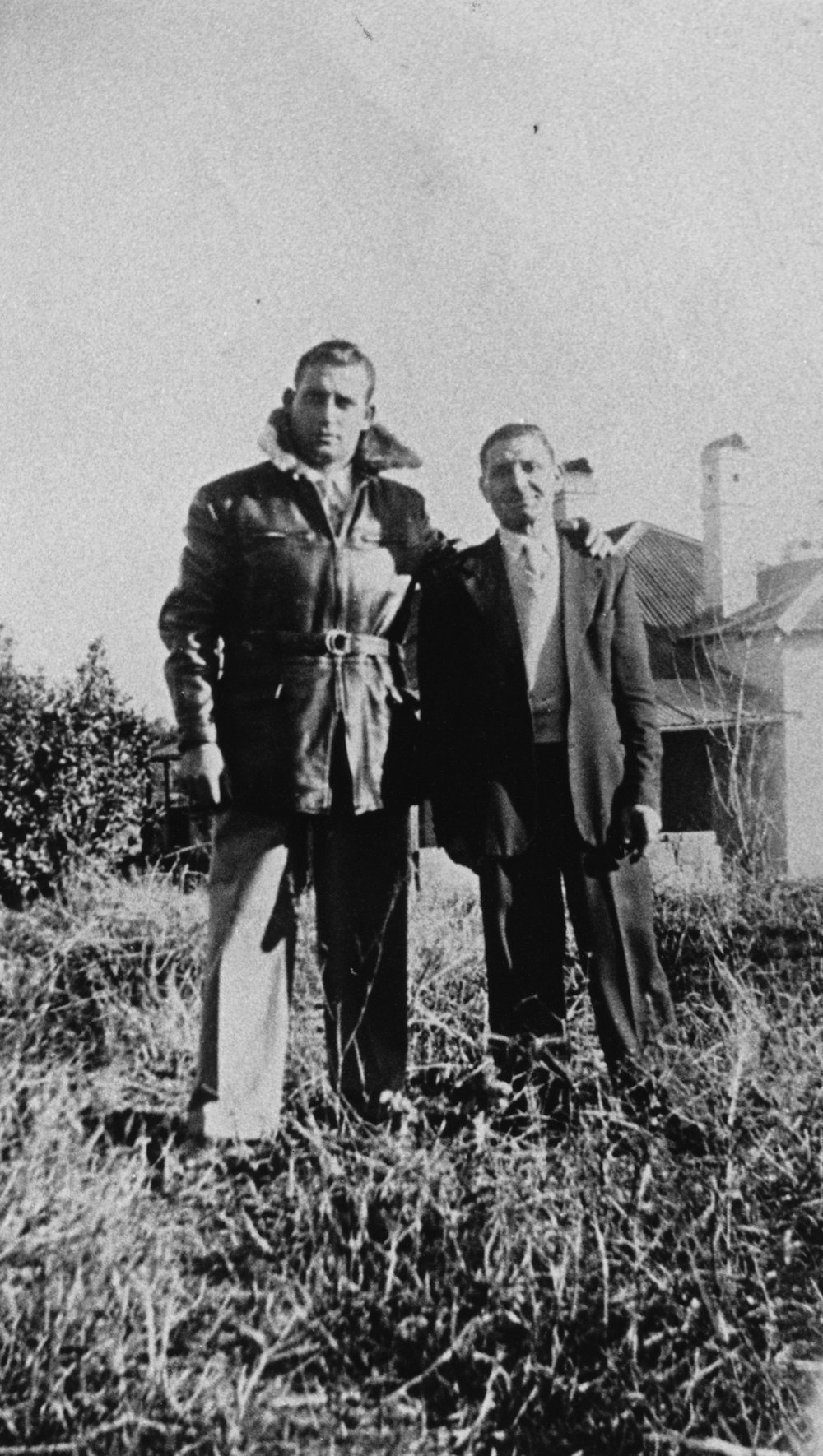 Unknown Gentlemen standing in the front garden