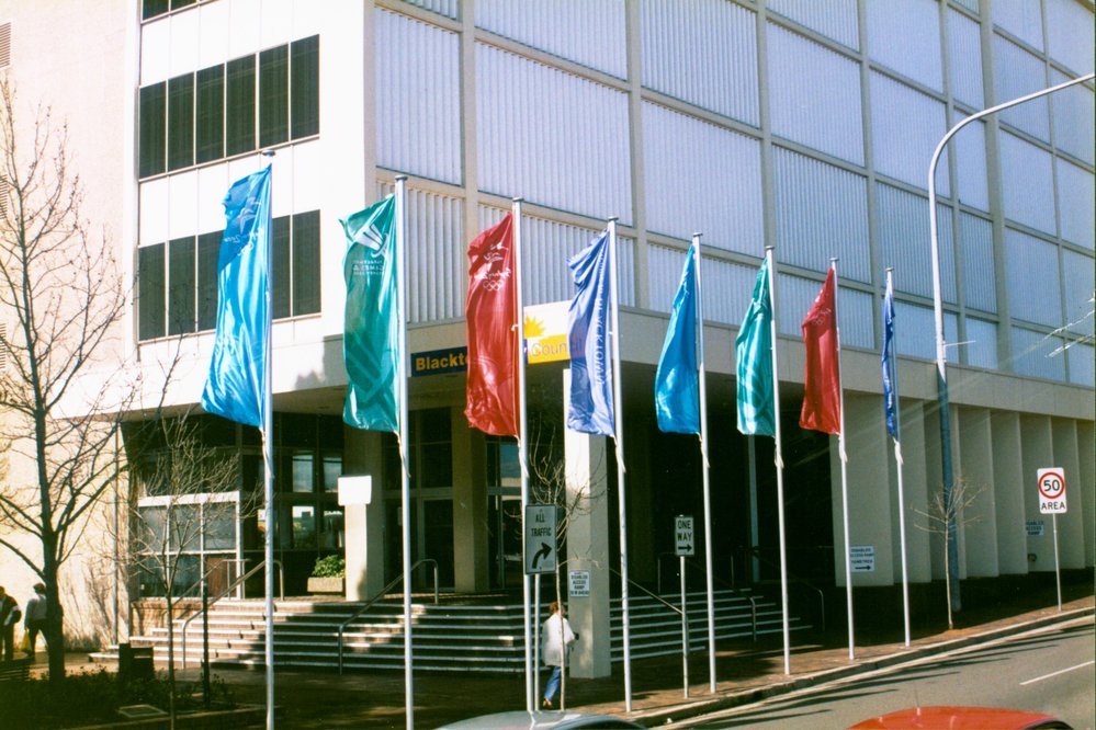 Olympic and Paralympic flags outside Blacktown City Council building