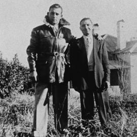 Unknown Gentlemen standing in the front garden