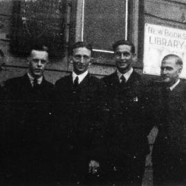 Group of men in front of Blacktown School of Arts building