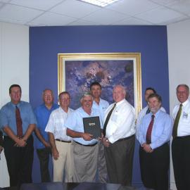 Owen Whalan with fellow staff members