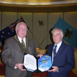 Robert Salis receiving 25 years service award
