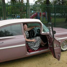 Rosemary Phillis in a vintage car