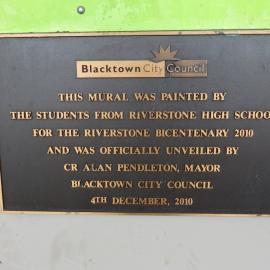 Riverstone Village mural, Plaque